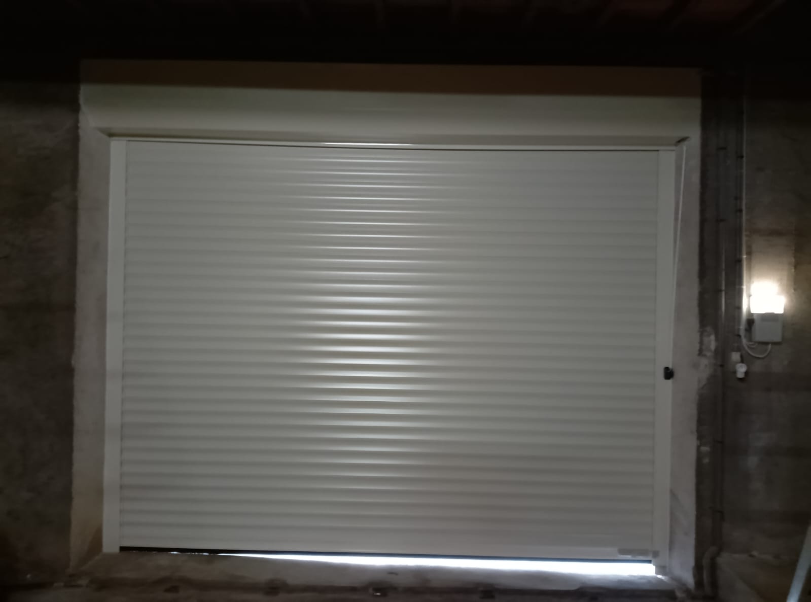 03/12/2025 Installation d'une porte de garage 