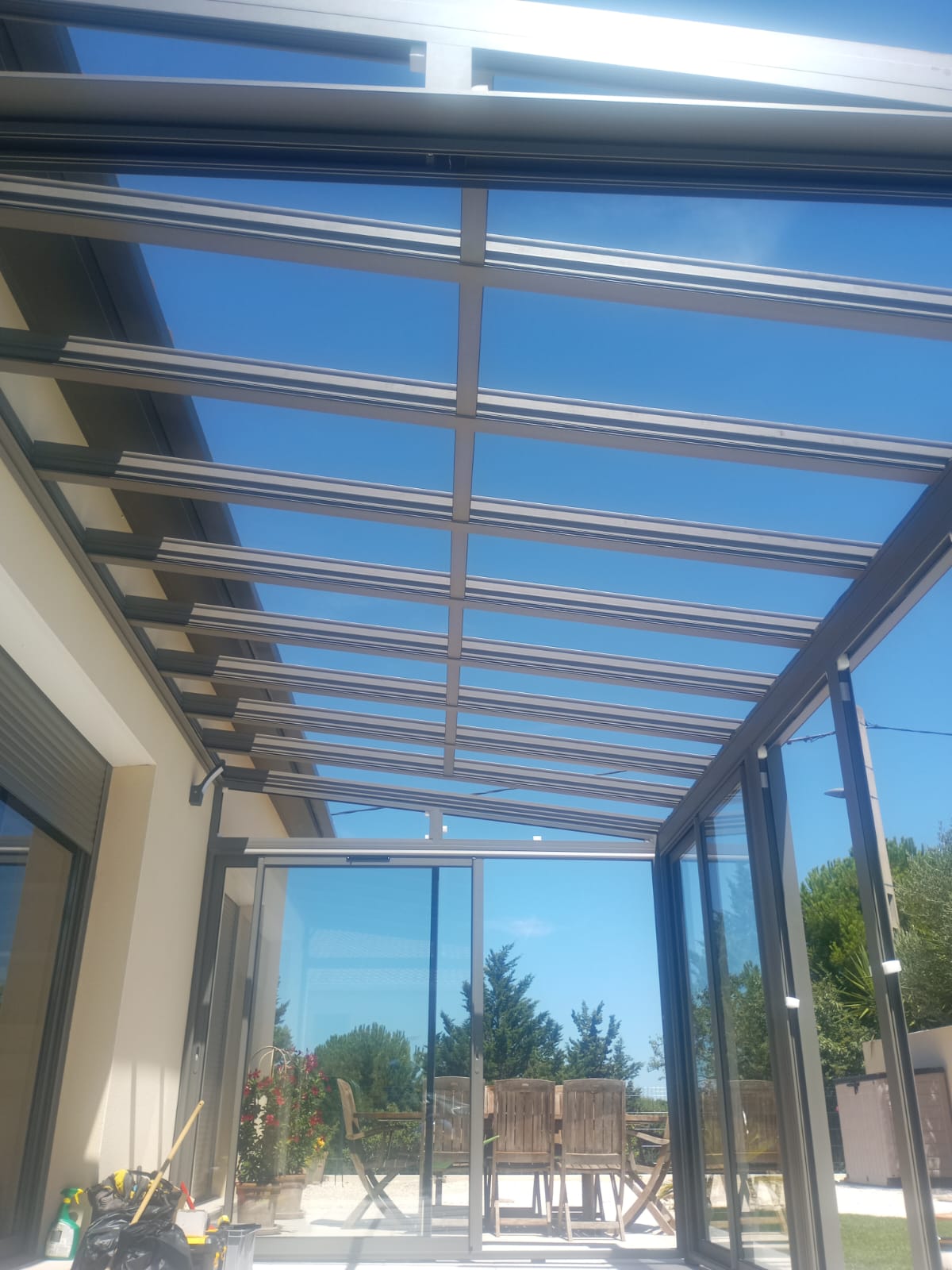 28/07/2025 Pose d une vranda aluminium gris quartz  ALIGNAN DU VENT 34290